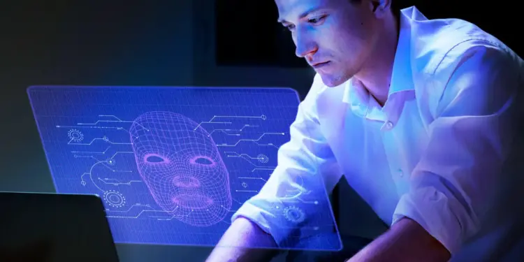 Homem analisando projeção digital com rosto estilizado, representando IA.